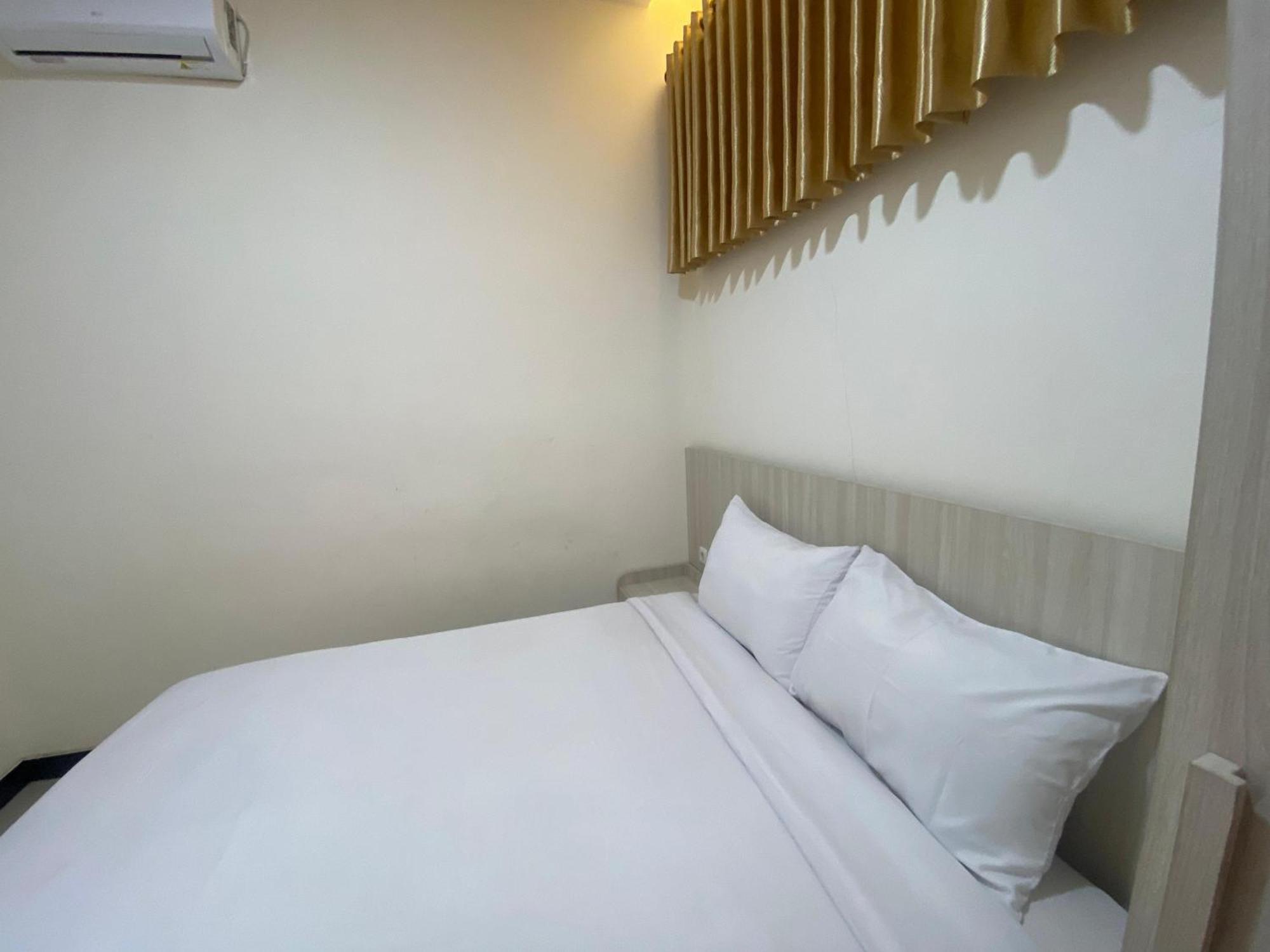 Kanggo Riko Family Homestay Mitra Reddoorz Баньювангі Екстер'єр фото